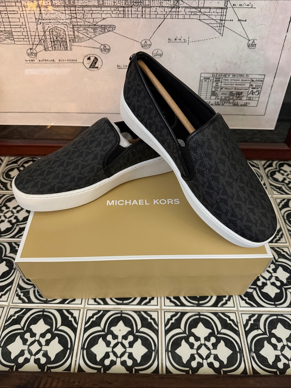 Michael Kors Black Slip-On MK Logo Sneakers with White Soles